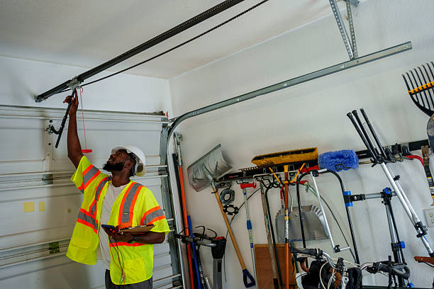 Professional Garage Door Panel Replacement technician working in Hudson Falls, NY